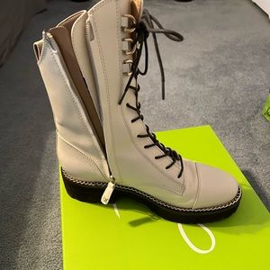 Sam Edelman cream color combat boot with beautiful gold link detail